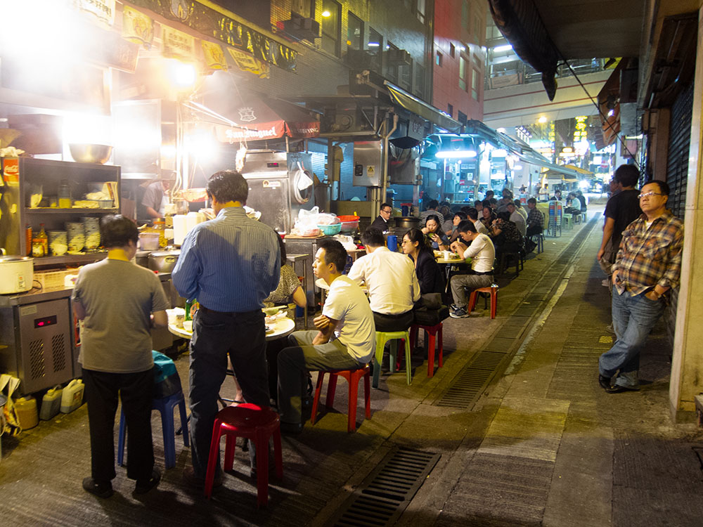 Street Restaurant at Night in the Escalaters, Hong Kong.